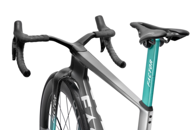 Road bike side view with aero frame, black bar tape, and teal front fork