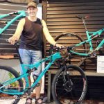 Man with bike — Bike Shop in Noosaville, QLD